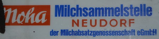 Schild der Milchsammelstelle Neudorf